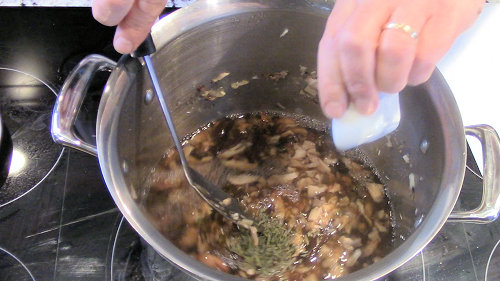 {image: Add the herbs to the gravy}