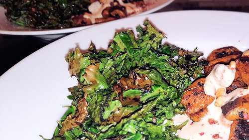 {image: Roasted Kale served with Pumpkin Gnocchi}